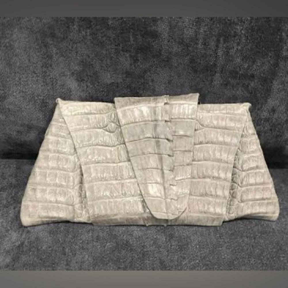 Juliette Jake Wrap Around Crocodile Tail Clutch
(Originally purchased for $550)